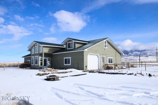 view of snow covered property