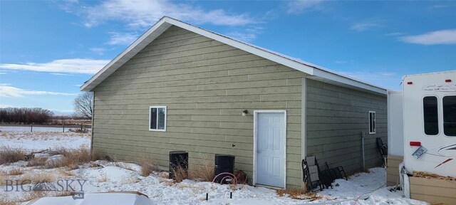 view of snow covered property