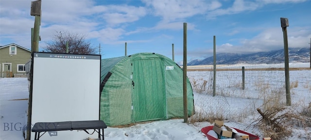 4008 Mt Highway 287, Twin Bridges, MT 59754 - snow covered structure featuring a mountain view