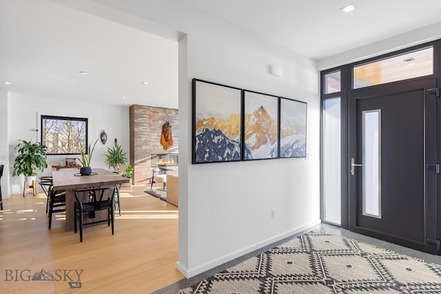 entryway with light hardwood / wood-style flooring