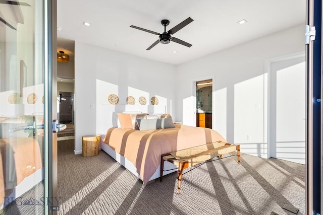 carpeted bedroom with ceiling fan