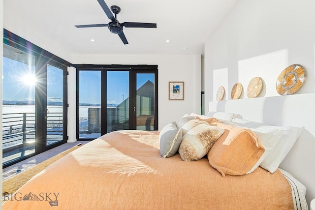 bedroom featuring ceiling fan and access to exterior