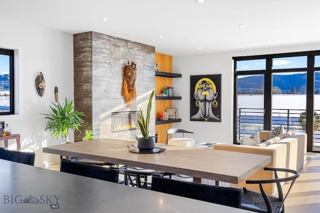 dining room featuring a fireplace