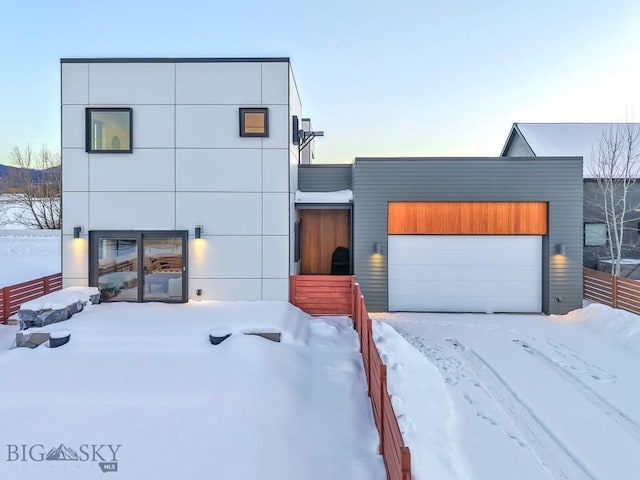 modern home featuring a garage