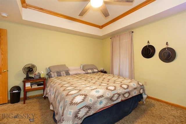 bedroom featuring baseboards, a ceiling fan, carpet floors, and crown molding