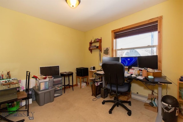 carpeted office space with baseboard heating