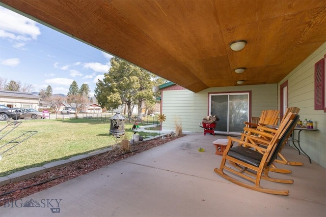 view of patio featuring fence