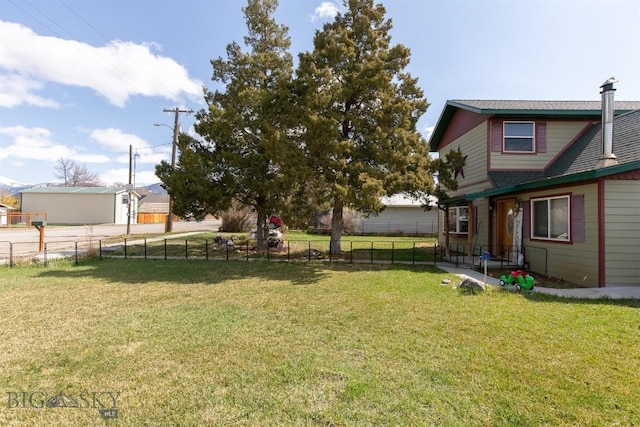 view of yard with fence