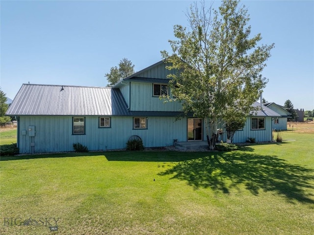 7 Hardy, Ennis, MT 59729 - rear view of property with a lawn and metal roof