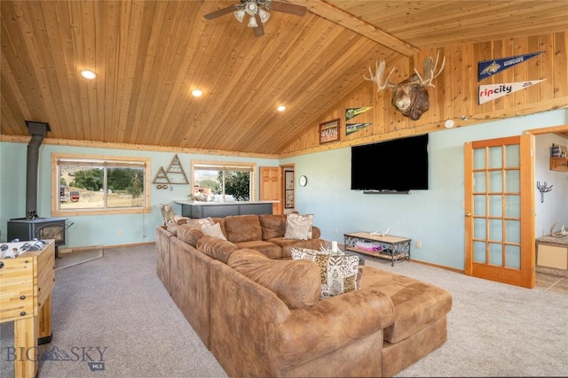 7 Hardy, Ennis, MT 59729 - carpeted living room featuring wood ceiling, a wood stove, a ceiling fan, baseboards, and recessed lighting