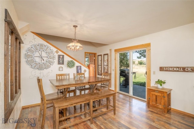 7 Hardy, Ennis, MT 59729 - dining area with wood finished floors, a chandelier, and baseboards