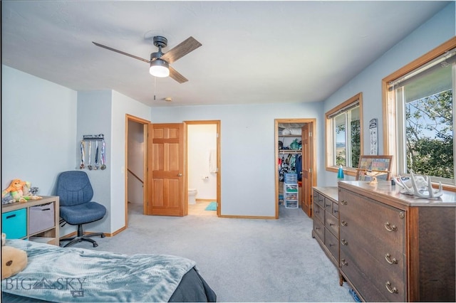 7 Hardy, Ennis, MT 59729 - bedroom featuring baseboards, light colored carpet, a spacious closet, connected bathroom, and a closet