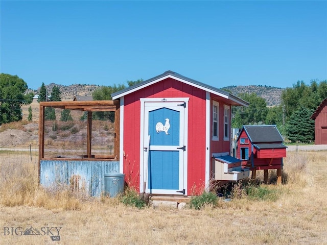 7 Hardy, Ennis, MT 59729 - view of shed featuring exterior structure and a mountain view
