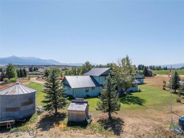 7 Hardy, Ennis, MT 59729 - view of green lawn featuring a mountain view
