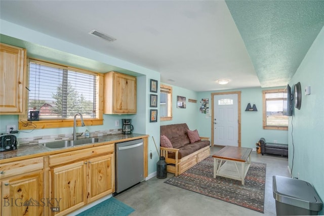 7 Hardy, Ennis, MT 59729 - kitchen with dishwasher, a sink, finished concrete floors, and light brown cabinetry