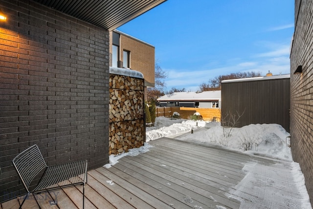 view of snow covered deck