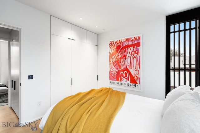 bedroom featuring light hardwood / wood-style flooring