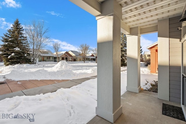 view of snow covered patio