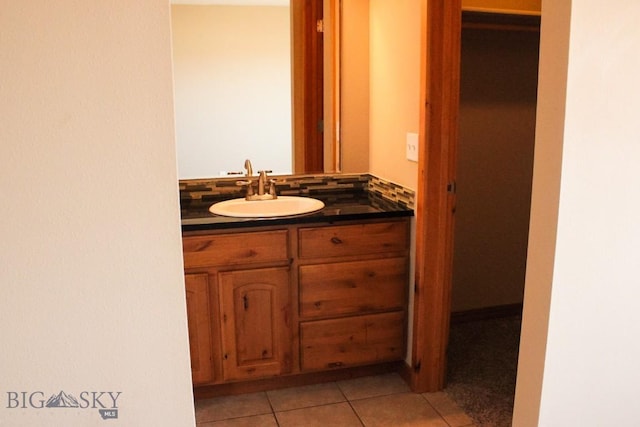 bathroom with vanity and tile patterned floors