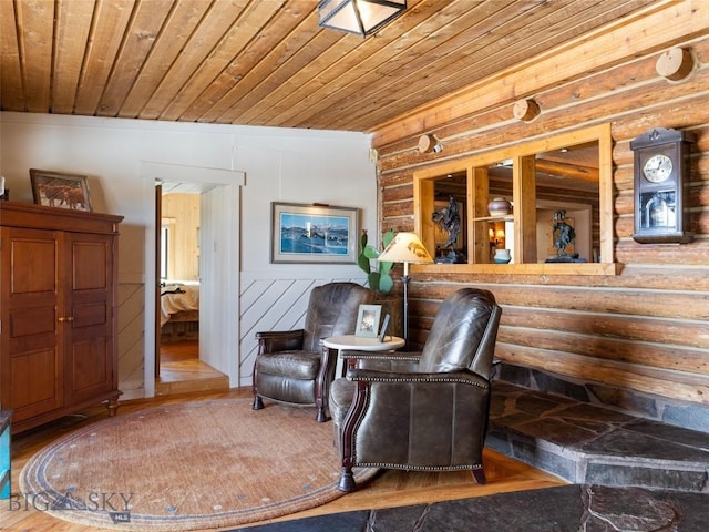 107 Dry Creek Trl, Ennis, MT 59729 - living area featuring log walls, wood ceiling, and wood finished floors