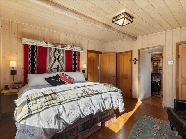 107 Dry Creek Trl, Ennis, MT 59729 - bedroom with wood ceiling, wooden walls, wood finished floors, and a closet