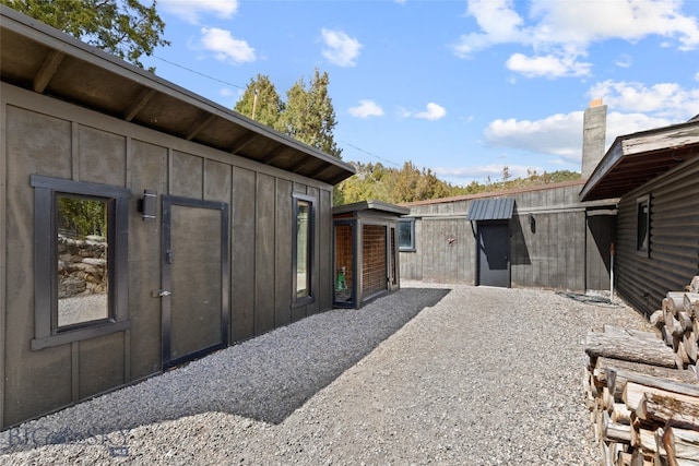 107 Dry Creek Trl, Ennis, MT 59729 - view of property exterior with board and batten siding
