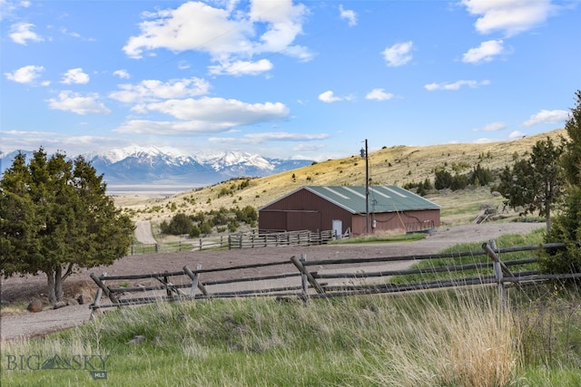 107 Dry Creek Trl, Ennis, MT 59729 - view of yard with a view of countryside, an outbuilding, a mountain view, and an exterior structure