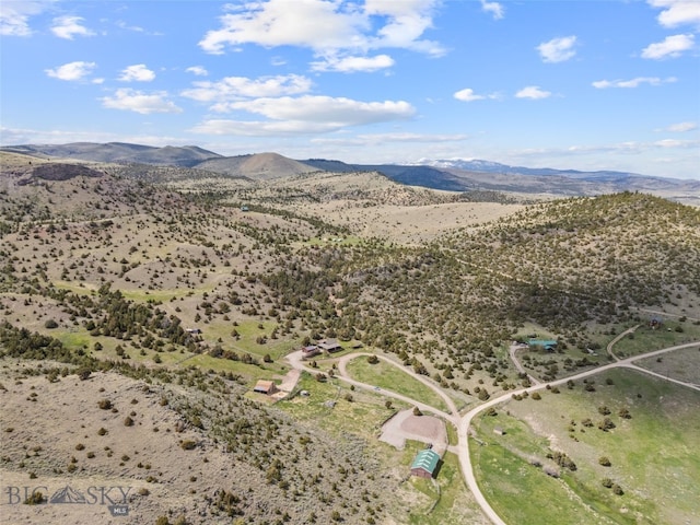 107 Dry Creek Trl, Ennis, MT 59729 - aerial overview of property's location with a desert landscape, mountains, and rural landscape