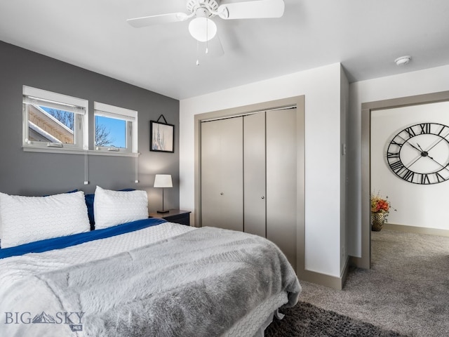 bedroom with ceiling fan, carpet, and a closet