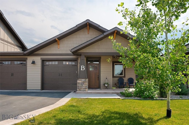 craftsman-style house with a garage, a front yard, and a porch