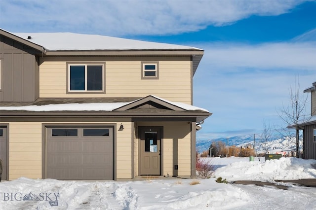 front of property with a garage