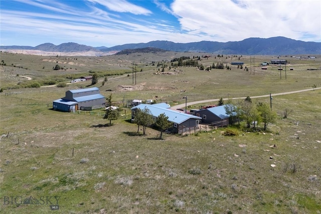 bird's eye view with a mountain view and a rural view