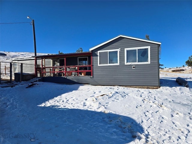 view of snow covered property