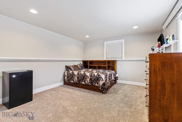 bedroom with light colored carpet