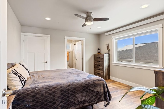 bedroom featuring light wood-type flooring and ceiling fan