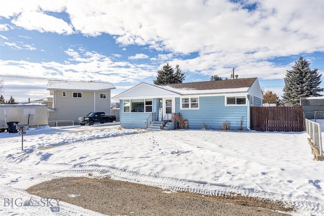 view of snow covered property