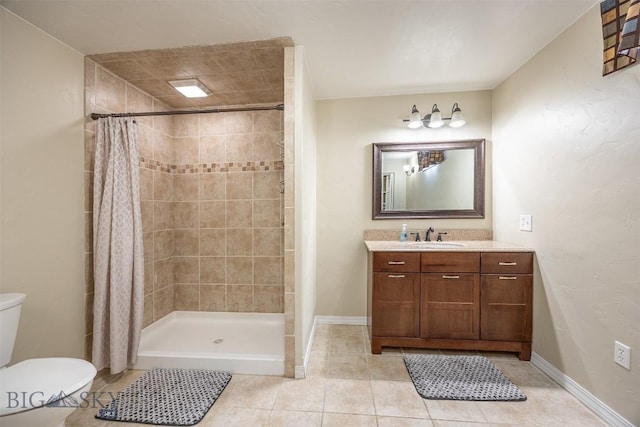 bathroom with toilet, walk in shower, tile patterned floors, and vanity