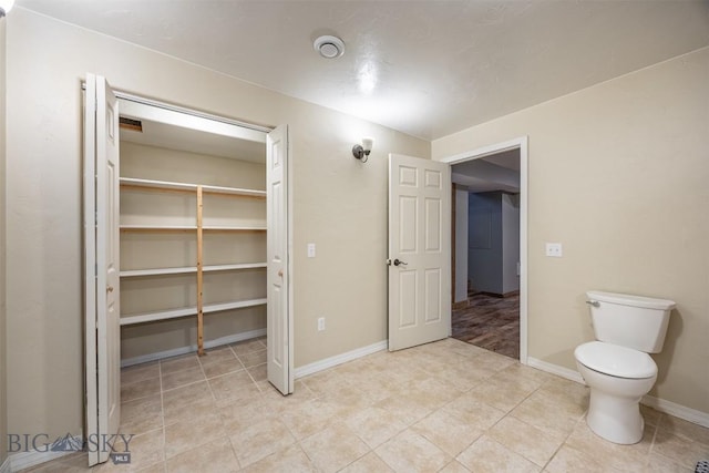 bathroom featuring toilet