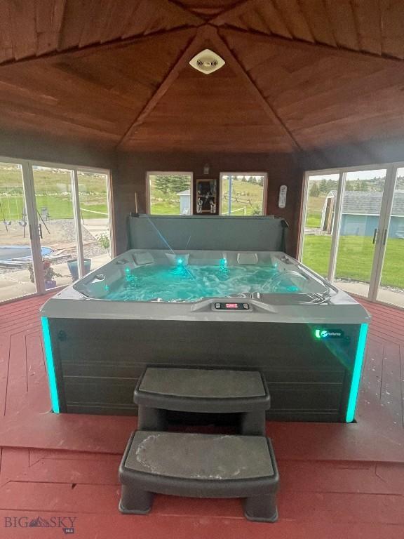 view of pool featuring an indoor hot tub