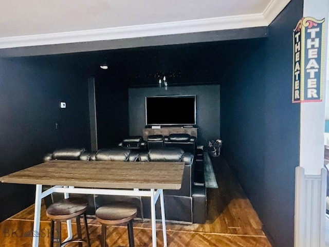 office space featuring wood-type flooring and ornamental molding