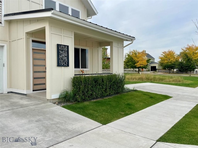 view of property exterior featuring board and batten siding