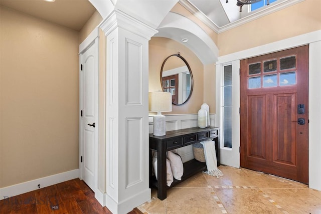 foyer entrance with ornamental molding