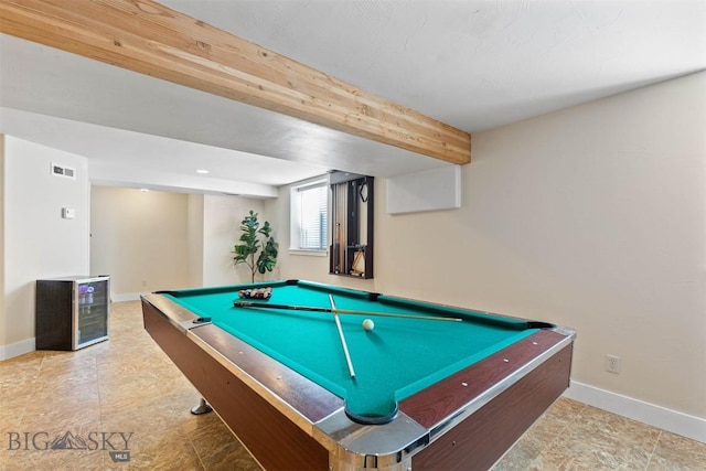 rec room with beam ceiling