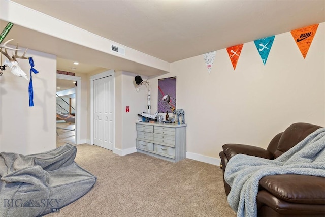 sitting room with light carpet