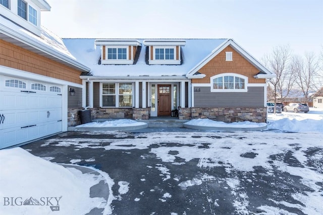 view of front of property featuring a garage