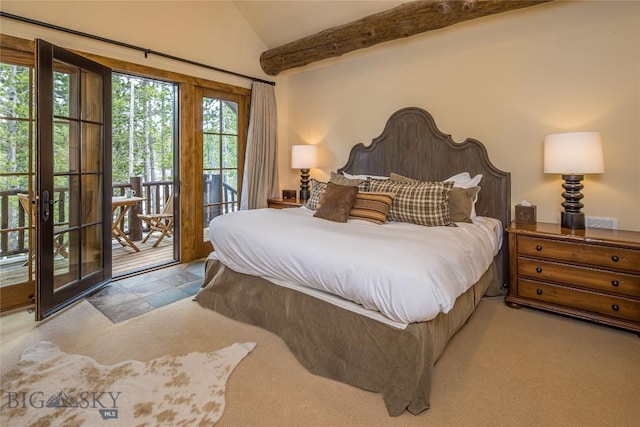 carpeted bedroom featuring access to exterior and lofted ceiling