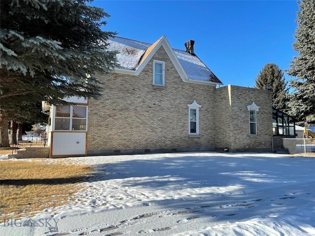 view of snow covered exterior