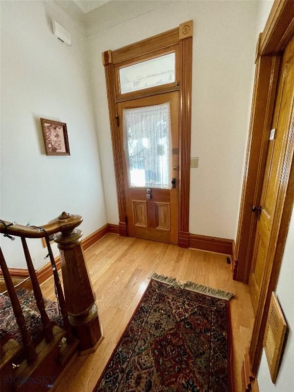 entryway with light hardwood / wood-style flooring