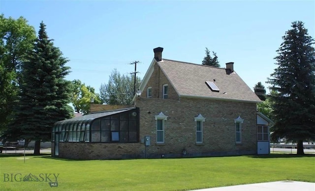 view of property exterior featuring a lawn