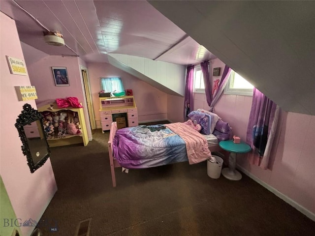 bedroom featuring lofted ceiling